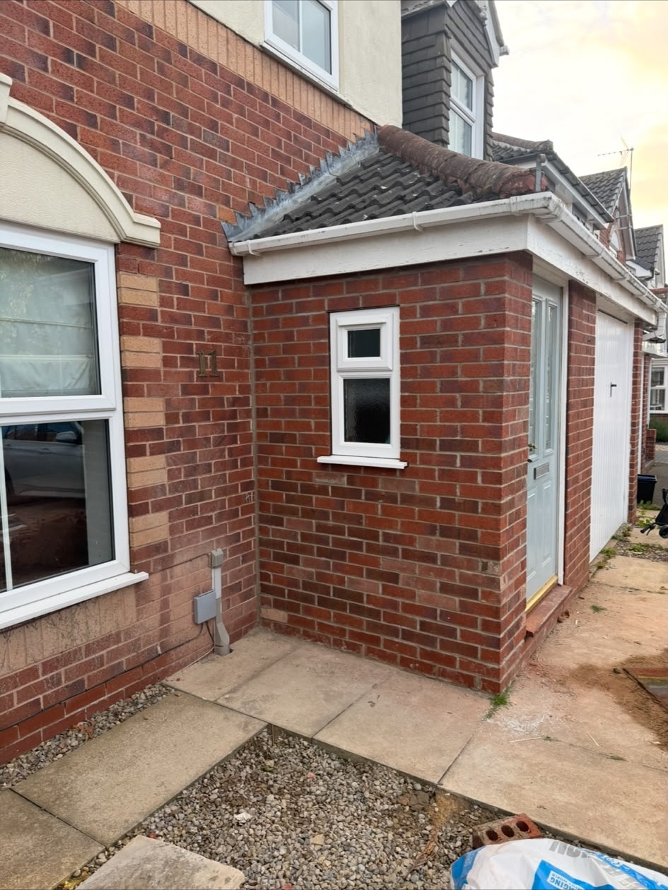 Completed brick porch finished to match the house